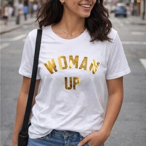 Women's White T-Shirt with Gold Print. 
Woman up. Size Small. Brand new.